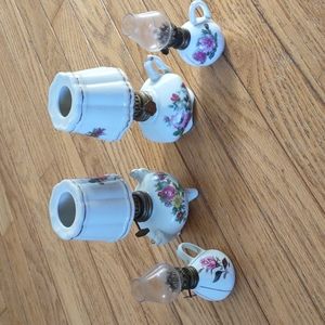 Four small oil lamps, each a bit different.